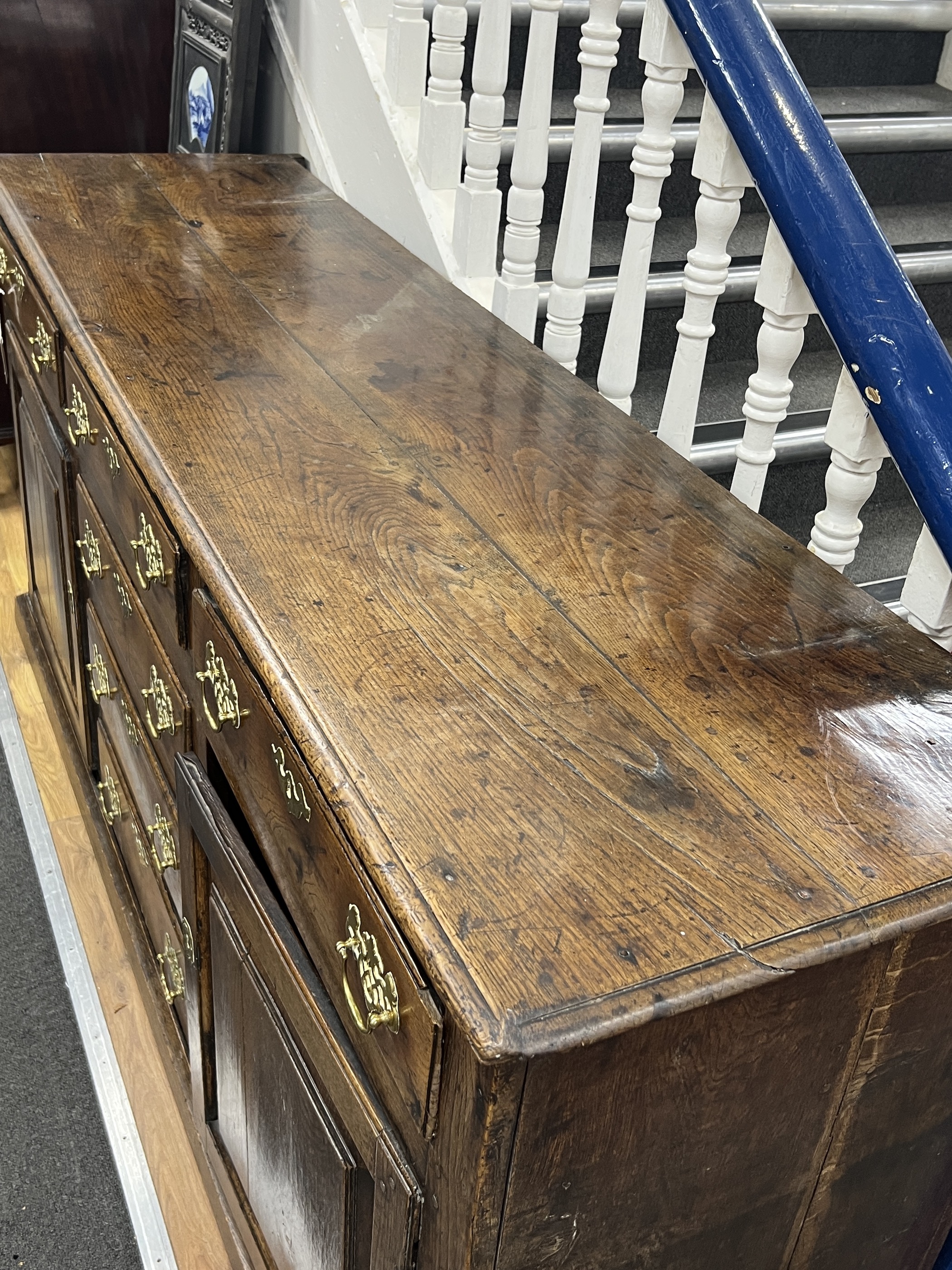 An 18th century oak low dresser, width 192cm, depth 51cm, height 89cm